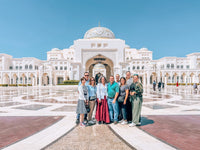 Guests in front of Qasr Al Watan, the Presidential Palace, on the Abu Dhabi Cultural Tour