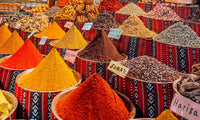 Pyramids of sumac, harissa and other spices piled high in the Deira Spice Souk, Dubai