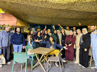 Teams celebrating together at the finale of the Old Dubai Corporate Scavenger Hunt